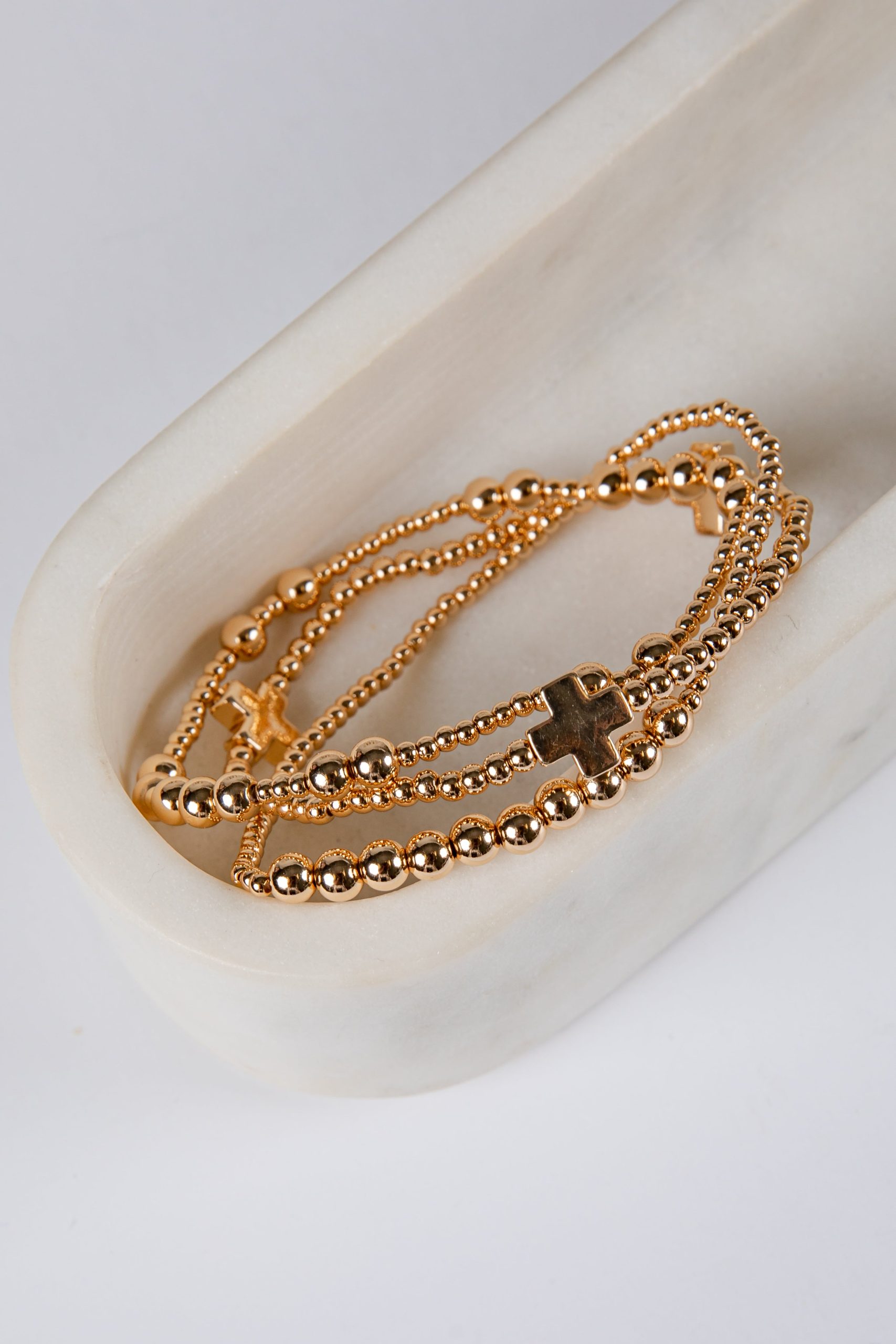 shopdressup_gold_beaded_cross_bracelet_set.jpg