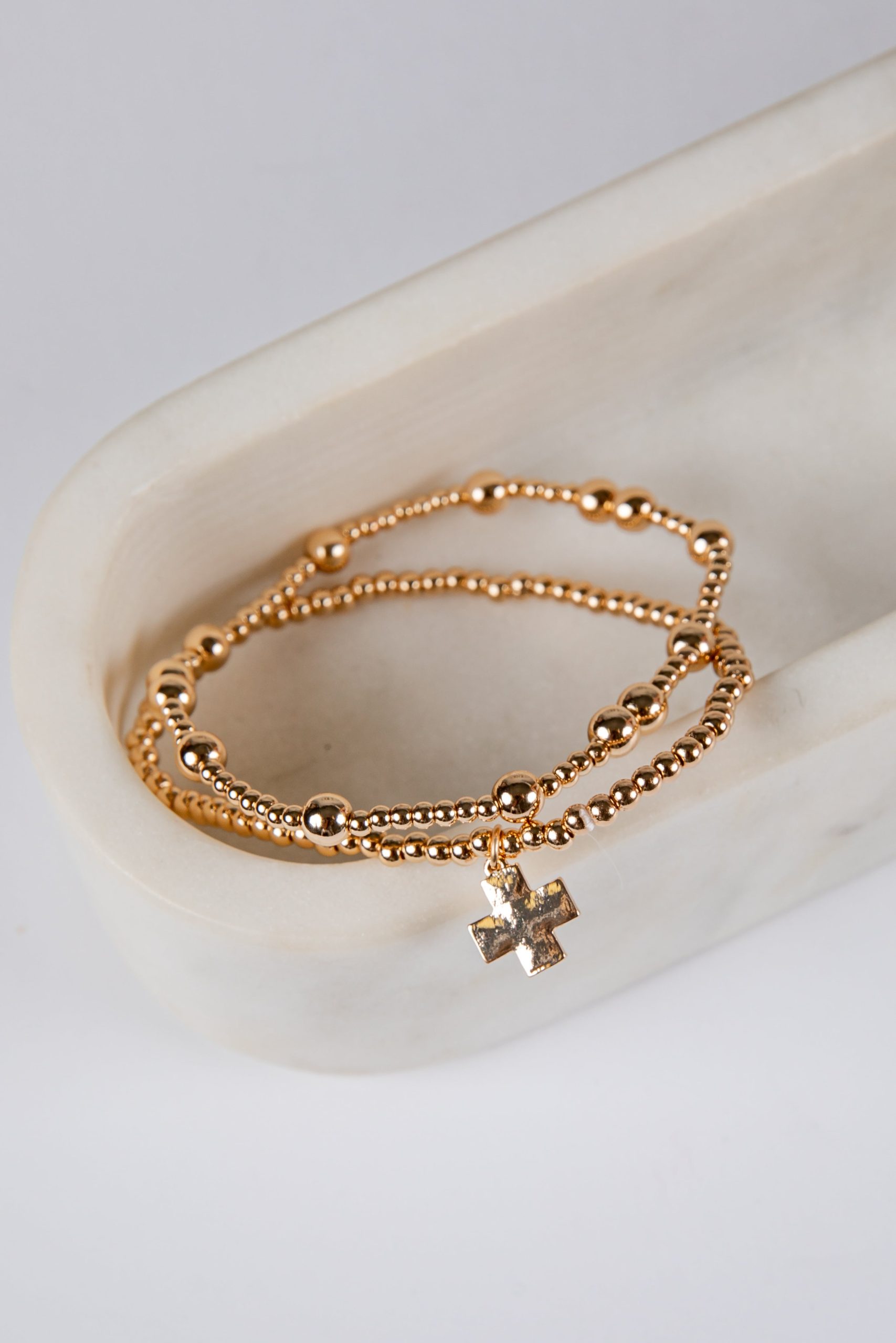 shopdressup_gold_beaded_cross_charm_bracelet_set.jpg