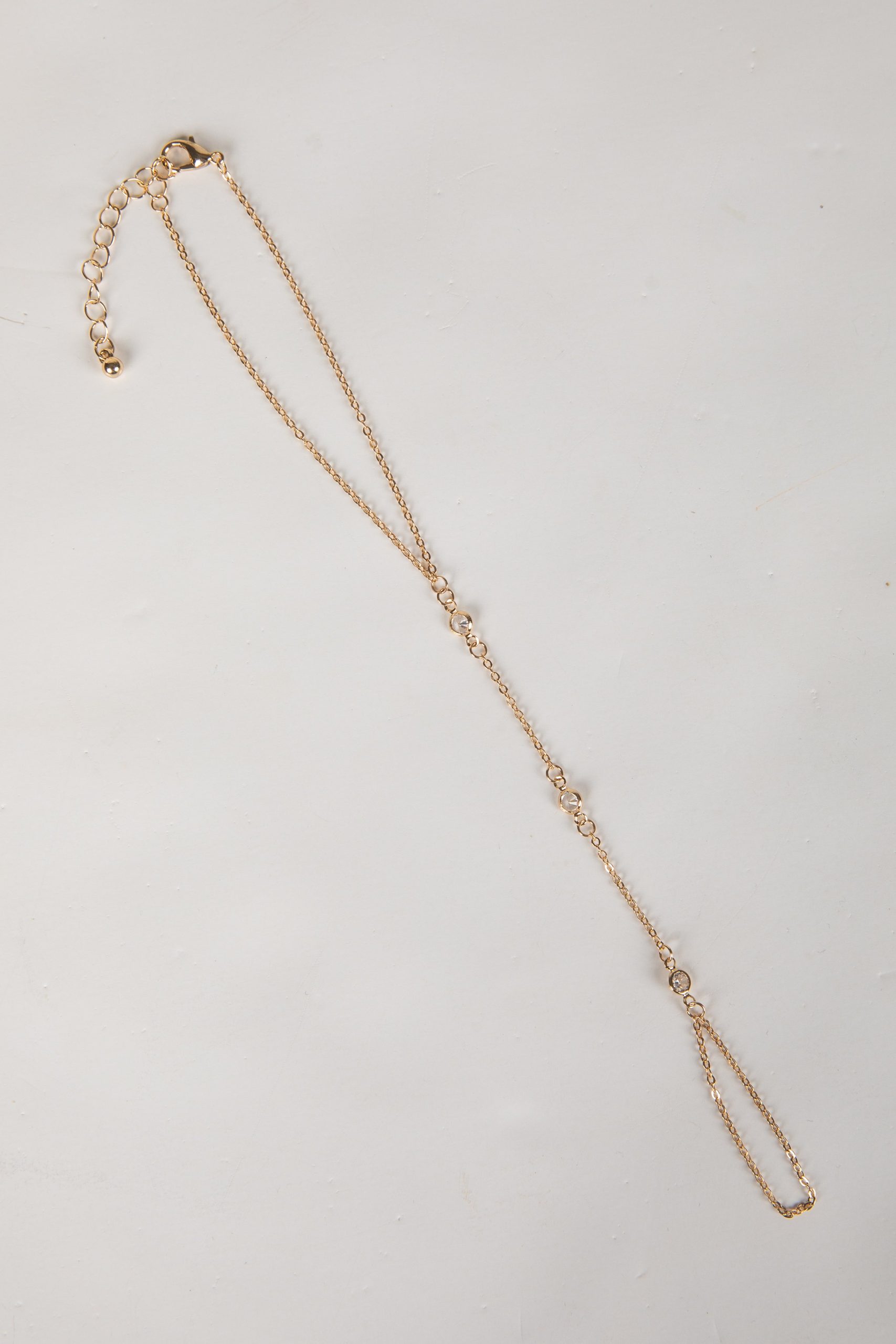 shopdressup_gold_gemstone_hand_chain_941460c7-b9bd-466a-9f78-73f61b98169d.jpg
